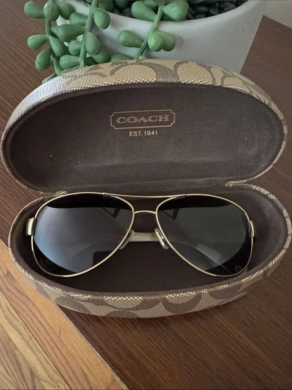 Coach Gold Aviator Sunglasses with Dark Lenses